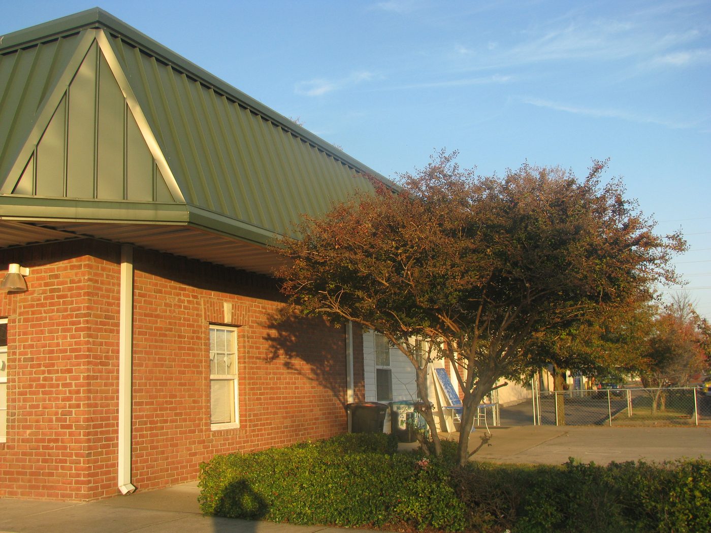 The Middle Tennessee Boulevard plaza that served as ICM's first home, a brick building with a green metal roof